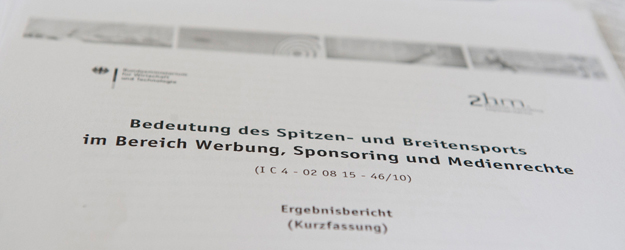 With the help of his colleague, the spaper 