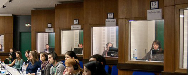 Professor Andres points to the conference room in the basement, where the Friday Conference, winner of a 2008 State Excellence Award, is held every week. (photo: Peter Pulkowski)