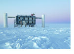 View over the ice at the geographic South Pole to the above ground measuring station of the IceCube observatory, where the data from the photo sensors in the ice is extracted and analyzed. (photo/©: Sven Lidstrom, IceCube/NSF)